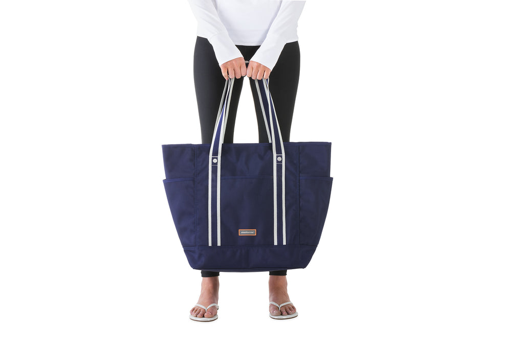 model holding wheelbarrow bag